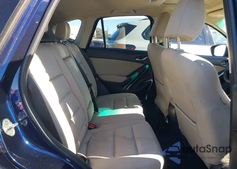 2013 Mazda Cx-5 Touring z USA, uszkodzony, nr VIN JM3KE2CE2D0141517